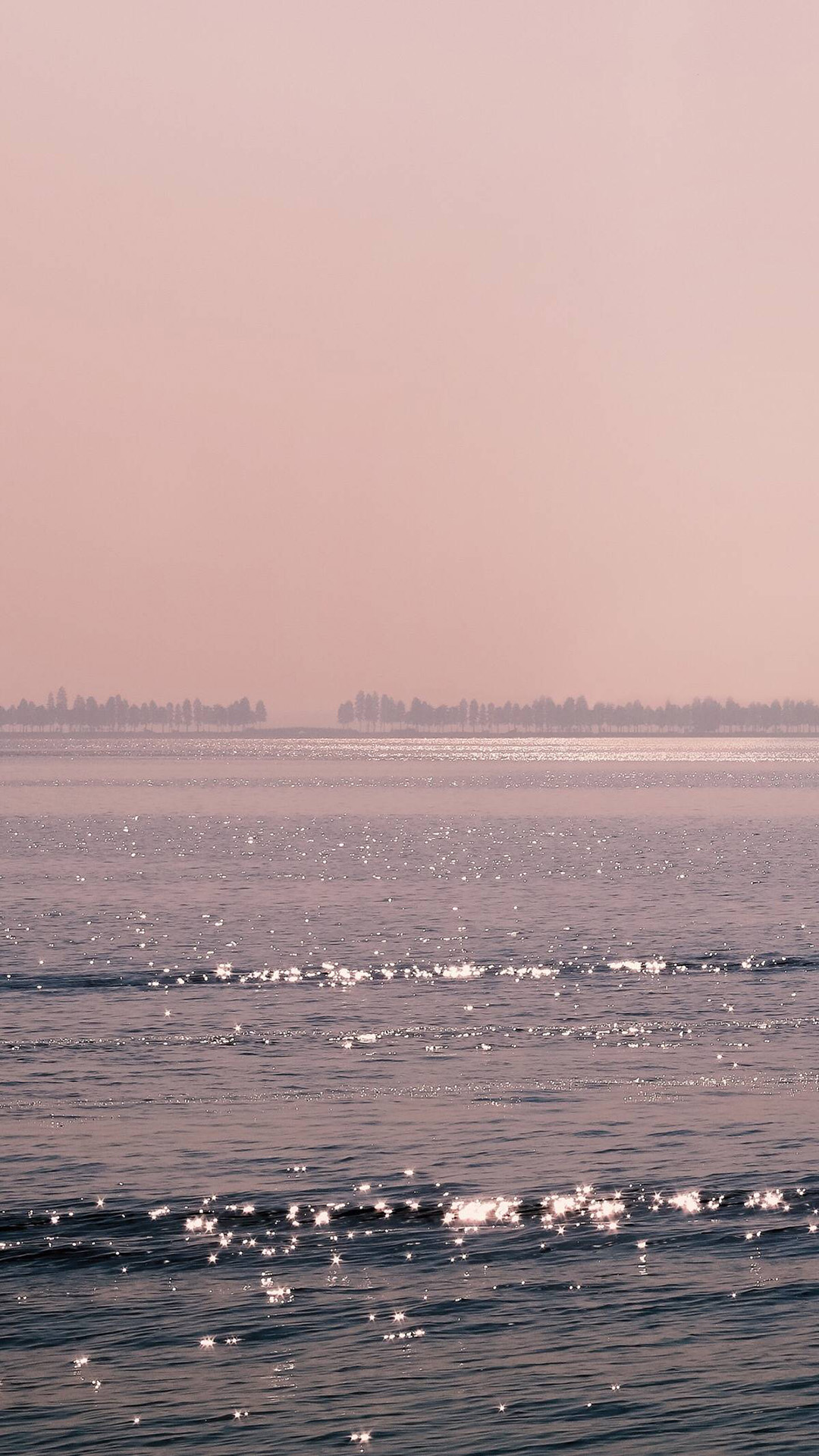 粉色的沙滩海岸风景手机壁纸